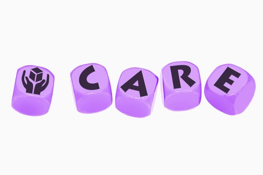 word CARE on cubes
