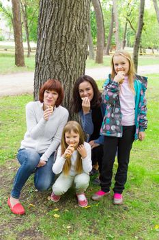 Photo of group people are eating in summer