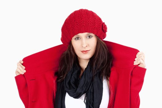 Young Woman in Red Coat and Cap - Isolated on White