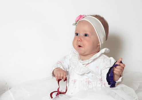 Beautiful small kid girl in studio