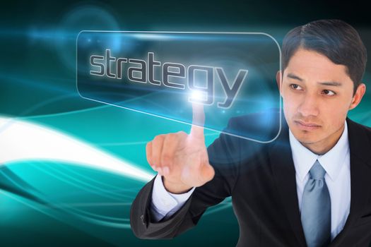 Businessman pointing to word strategy against abstract glowing black background