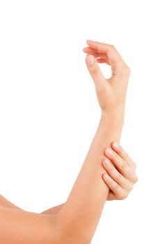 Female hand holding her forearm isolated on white background. Forearm pain, repetitive stress injury concept. 