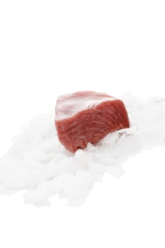 Fresh raw tuna steak on ice isolated on white background. Sashimi sushi. Fresh healthy seafood eating.