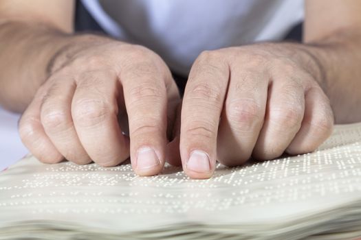 Blind reading text in braille language