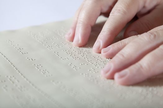 Blind reading text in braille language