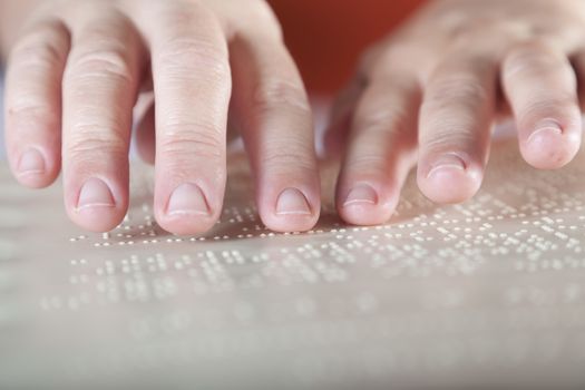 Blind reading text in braille language