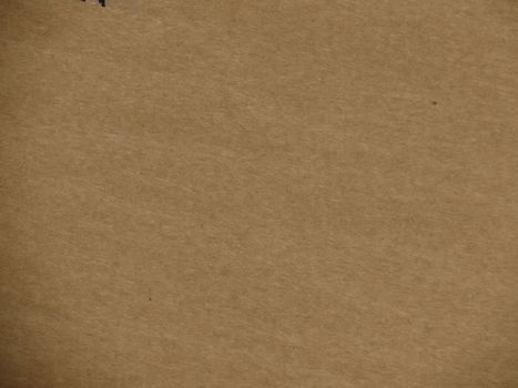 Blank sheet of old brown paper useful as a background