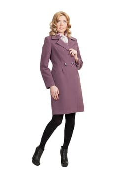 The girl in a violet  autumn coat on a white background