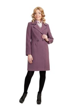 The girl in a violet  autumn coat on a white background