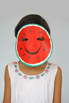 watermelon paper mask on girl face