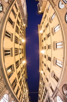 the facade of the buildings on the street calzaiuoli in Florence