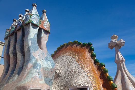 BARCELONA - APRIL 14: Roof architecture at Casa Batllo, (also could the house of bones) designed by Antoni Gaudi with his famous expressionistic style on April 14, 2012 in Barcelona, Spain