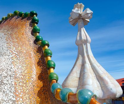 BARCELONA - APRIL 14: Roof architecture at Casa Batllo, (also could the house of bones) designed by Antoni Gaudi with his famous expressionistic style on April 14, 2012 in Barcelona, Spain