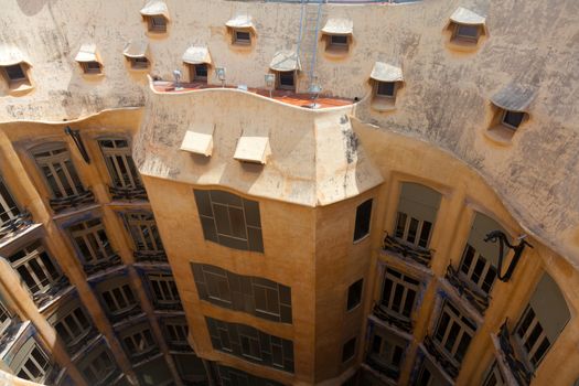 BARCELONA, SPAIN - APRIL 14: Antoni Gaudi's work at the roof of Casa Mila on Apr 14, 2012 in Barcelona, Spain. Popularly known as La Pedrera, this modernist house was built between 1906 and 1910.