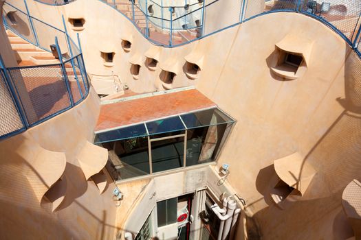 BARCELONA, SPAIN - APRIL 14: Antoni Gaudi's work at the roof of Casa Mila on Apr 14, 2012 in Barcelona, Spain. Popularly known as La Pedrera, this modernist house was built between 1906 and 1910.