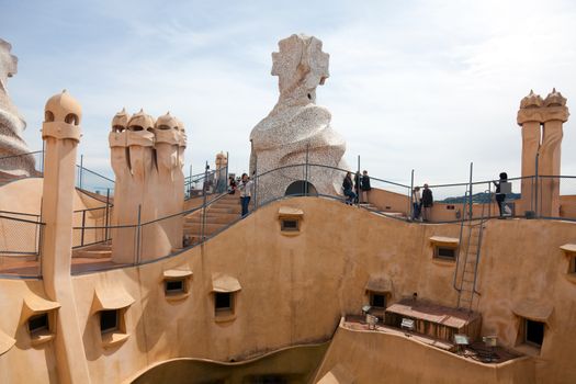 BARCELONA, SPAIN - APRIL 14: Antoni Gaudi's work at the roof of Casa Mila on Apr 14, 2012 in Barcelona, Spain. Popularly known as La Pedrera, this modernist house was built between 1906 and 1910.