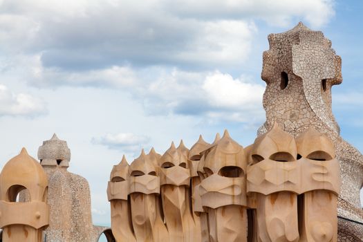 BARCELONA, SPAIN - APRIL 14: Antoni Gaudi's work at the roof of Casa Mila on Apr 14, 2012 in Barcelona, Spain. Popularly known as La Pedrera, this modernist house was built between 1906 and 1910.