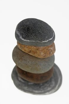 Five stones balanced on top of eachother