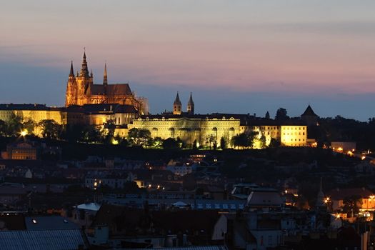 Photo shows details of Prague city at night.