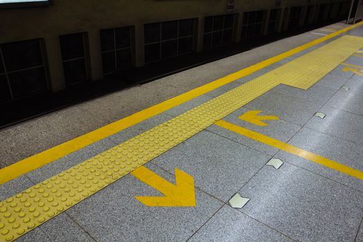 arrow on the road,subway station