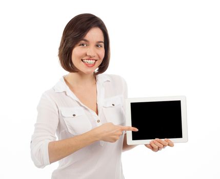 Cute brunette showing a blank touchpad with her finger, communication concept, isolated on white