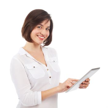 Young smiling woman using a touchpad, isolated on white