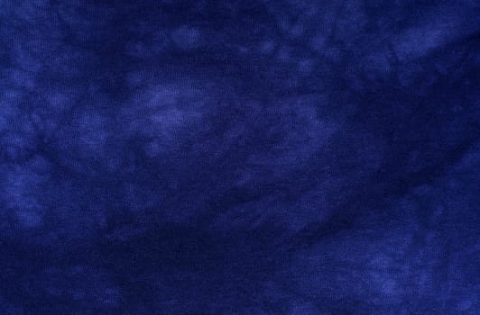 Dark blue fabric texture. Clothes background