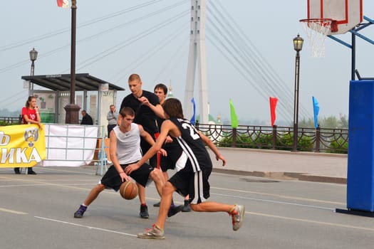 Street basketball at the foot bridge (The bridge of lovers) in Tyumen, Russia