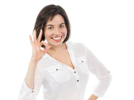 Portrait of confident woman having a successful gesture, isolated on white