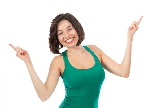 Cheerful woman displaying something with her fingers, isolated on white 