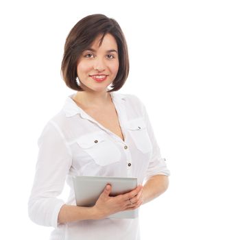 Young smiling brunette surfing on a touchpad, isolated on white