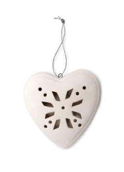 Christmas heart of porcelain on a white background