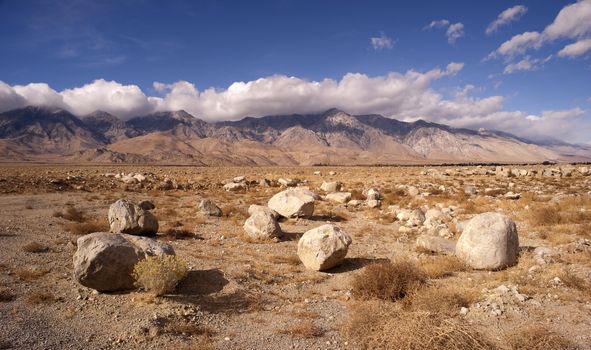 Large boulders dominate the scene on the floor in Death Valley