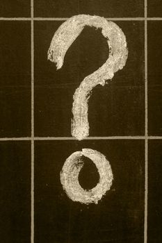 question-mark handwritten on black chalkboard