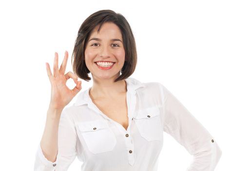 Portrait of young woman having a positive gesture, isolated on white