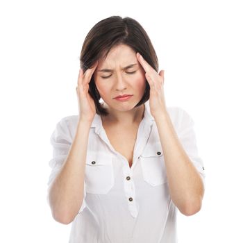 Portrait of young brunette suffering from headache, isolated on white