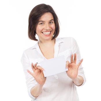 Young woman showing a white signboard, isolated on white