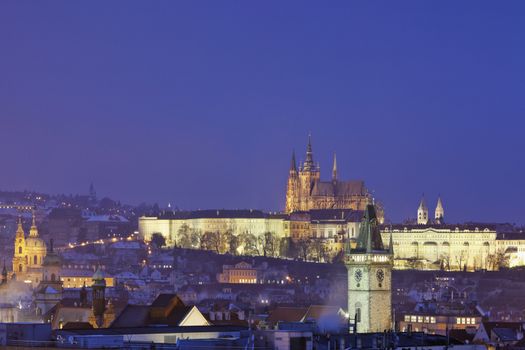 prague - spires of the old town and hradcany castle at dusk