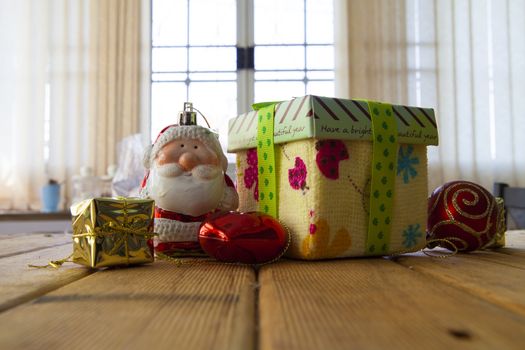 Wooden rustic background with  christmas presents.