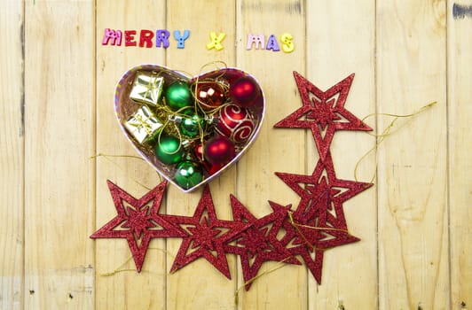 Christmas garland on rustic wood with copy space