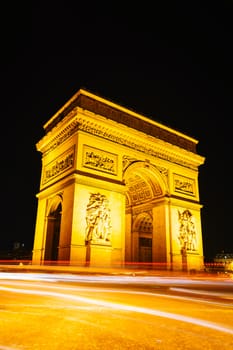 Arc de Triomphe de l'Etoile (The Triumphal Arch) in Paris at night