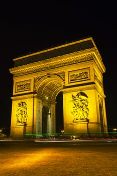 Arc de Triomphe de l'Etoile (The Triumphal Arch) in Paris at night