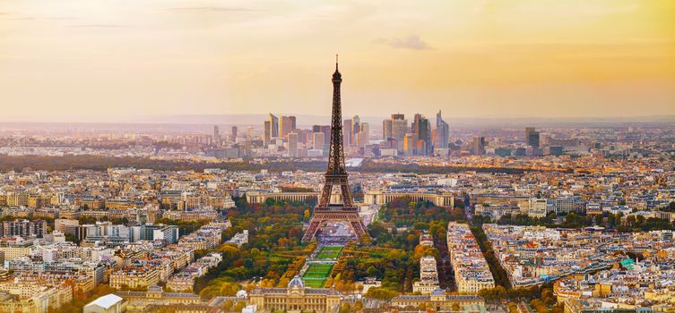 Aerial view of Paris with the Eiffel tower at sunset