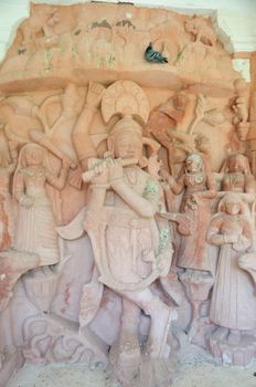 Ancient stone curved sculptures of Hindu God Lord Krishna