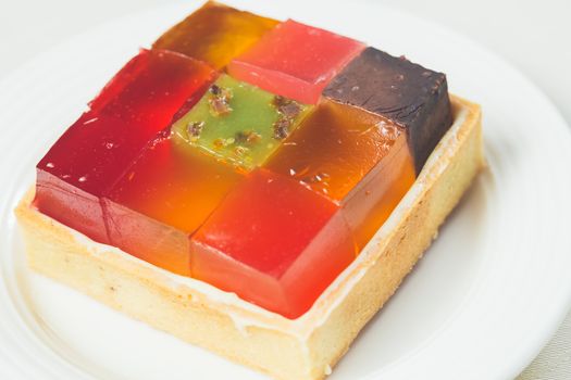 Colorful jelly dessert. Warm colors. Shallow dof. 