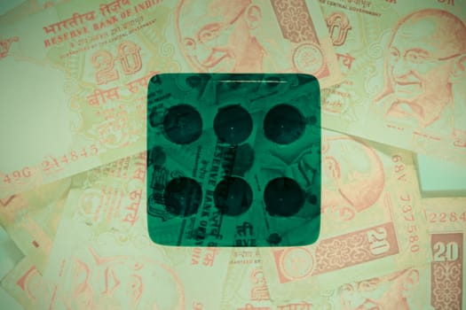 dice on money background, business concept