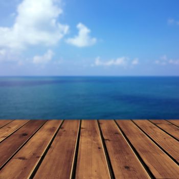 Ocean with sky and wood floor for background