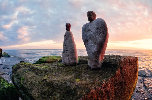 Figurines of man and woman of the stones at the sea