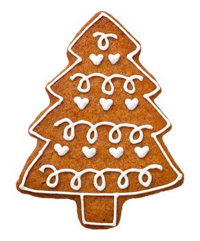 Gingerbread cookie for Christmas isolated on white background. Tree shape cookie