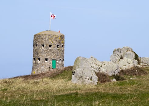 The British built 15 Guernsey loophole towers at various points along the coast of Guernsey between August 1778 and March 1779 to deter
 possible French attacks
One of the 15 loophole towers in Guernsey that guard the coastline.